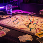 Les aventuriers du rail : boîte Europe ou USA sur table de jeu